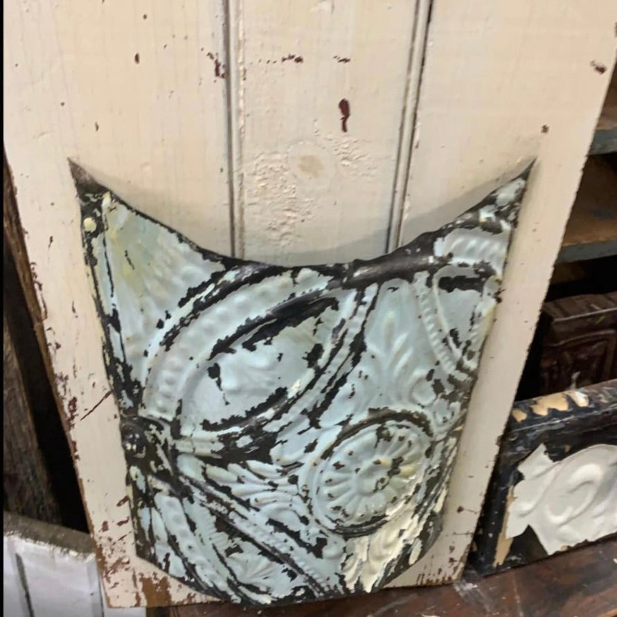 Embossed Ceiling Tin Pockets on Wood
