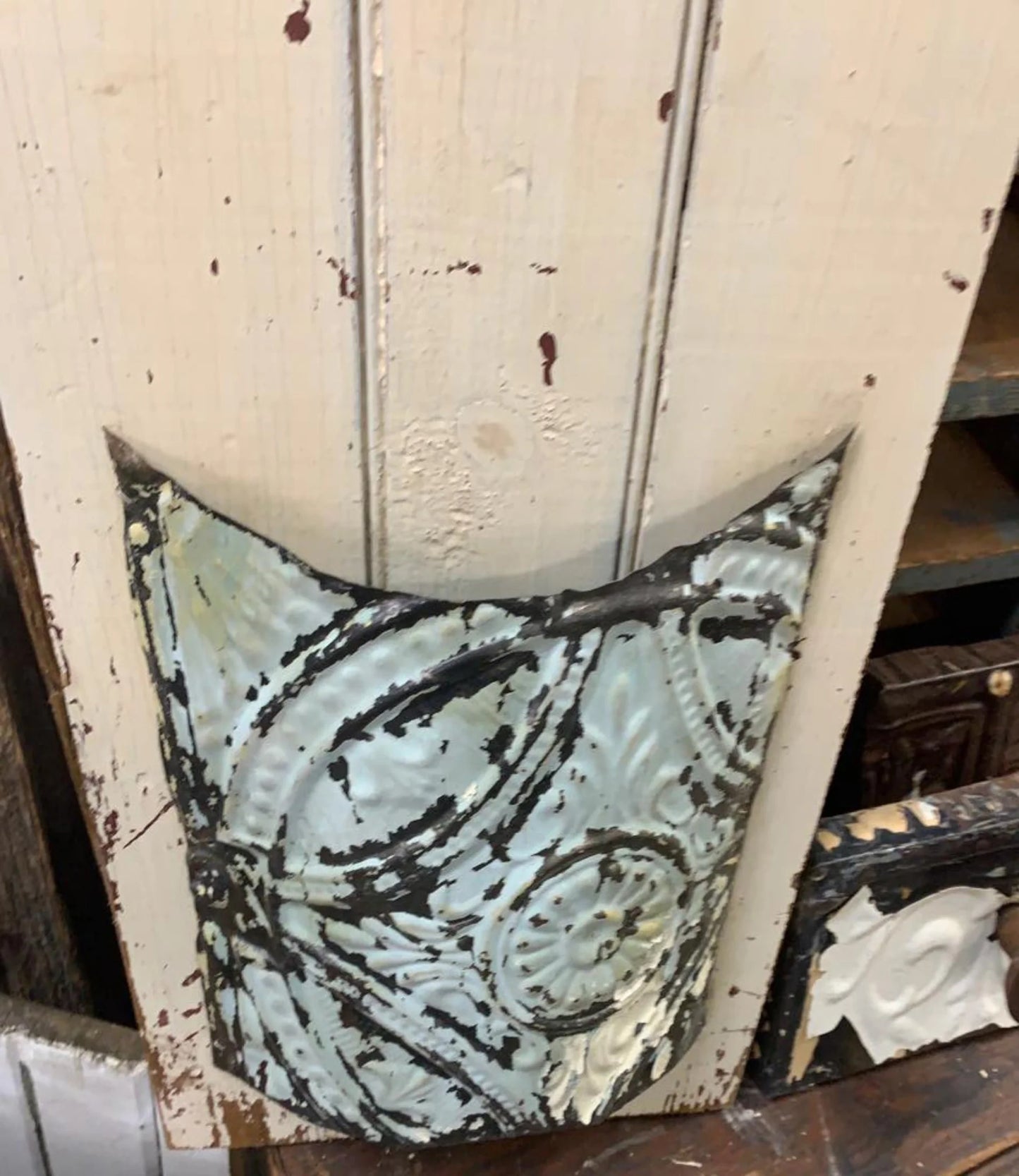 Embossed Ceiling Tin Pockets on Wood
